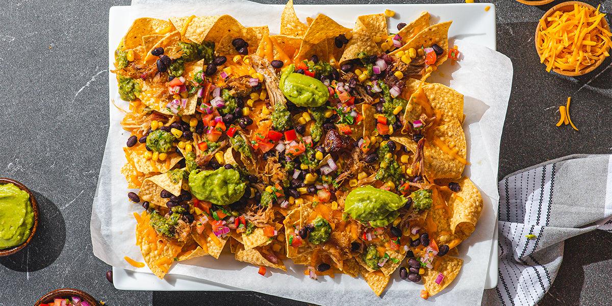 Loaded Carnitas Nachos - WECO Hospitality