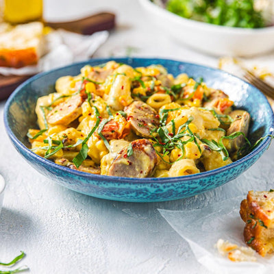 Sweet Corn & Miso Rigatoni with Sausage - WECO Hospitality